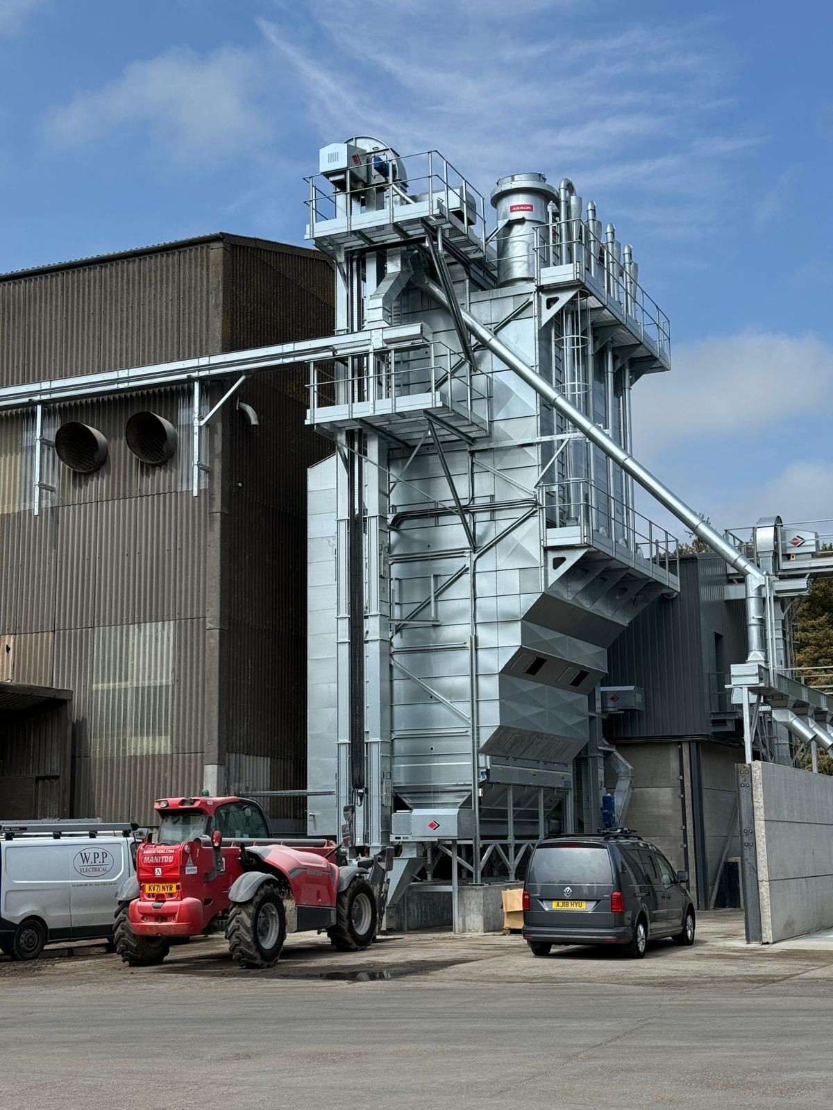 Industrial Electrical Services: WPP Electrical van at a large galvanised grain drying and processing plant wired for three-phase power